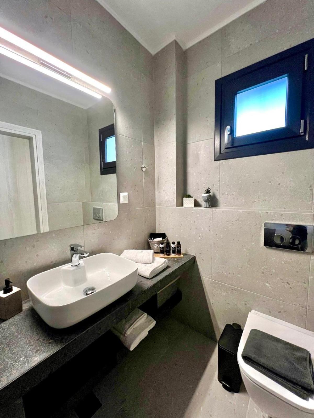 Four Shades Luxury Suites Сарти Экстерьер фото